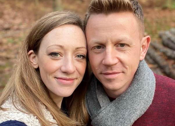 Adoptive Couple (man and woman close together)